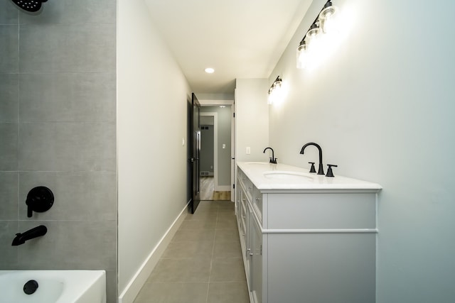 34067 Chatsworth Dr, Sterling Heights, MI 48312 - bathroom with tile patterned floors, double vanity, baseboards, recessed lighting, and washtub / shower combination