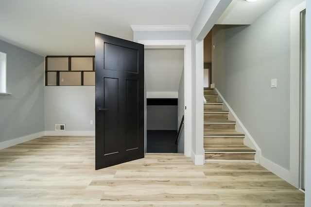 34067 Chatsworth Dr, Sterling Heights, MI 48312 - stairs with wood finished floors, baseboards, and crown molding