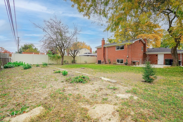 34067 Chatsworth Dr, Sterling Heights, MI 48312 - view of yard with a patio area and central AC unit