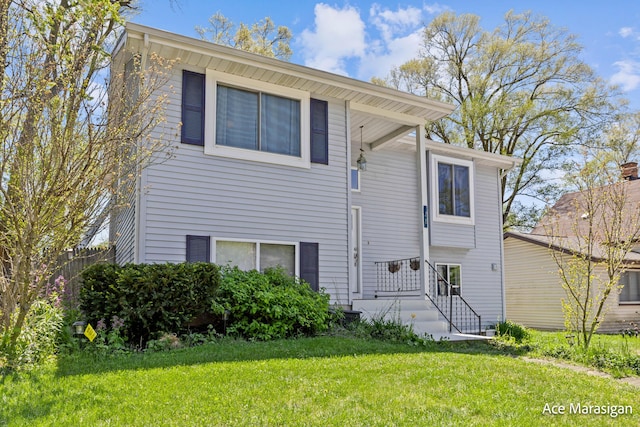 view of front of home with a front lawn
