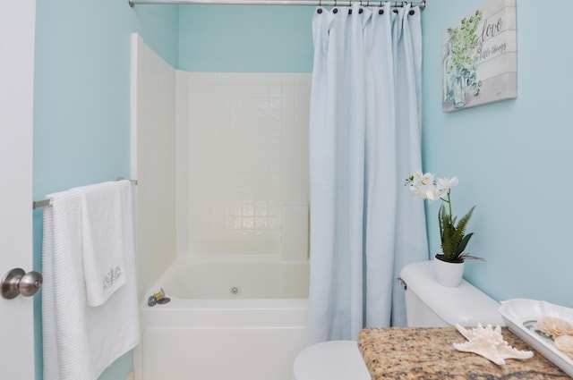 full bathroom featuring toilet and shower / bath combination with curtain
