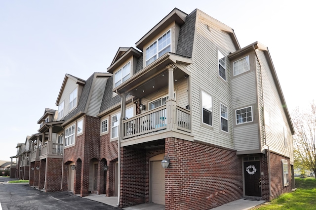 view of building exterior featuring a garage