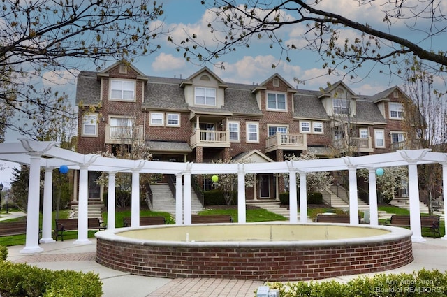 surrounding community with a pergola