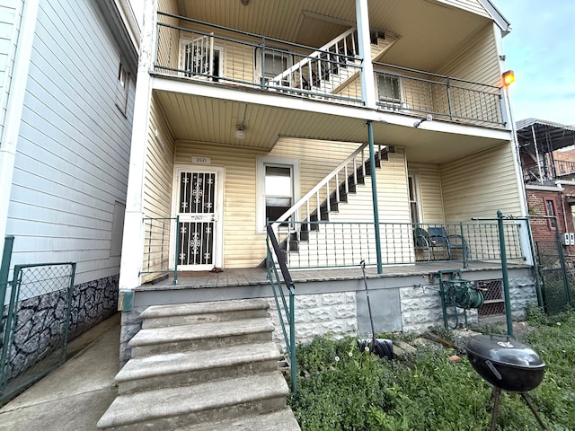 doorway to property with a balcony