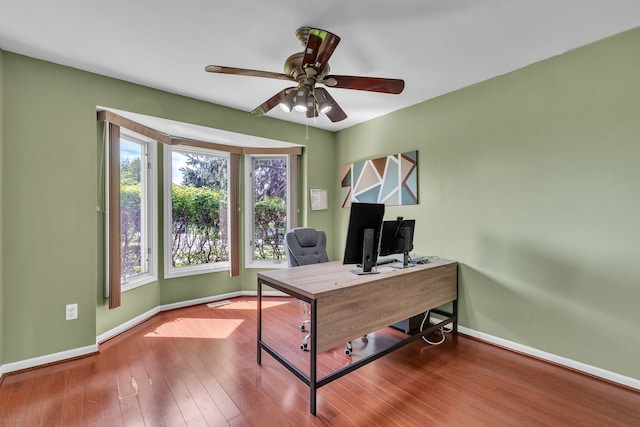20261 Ramblewood Dr, Macomb, MI 48044 - office with baseboards, plenty of natural light, a ceiling fan, and wood finished floors