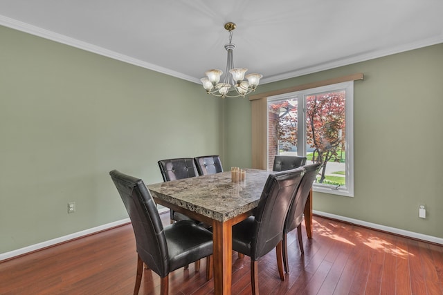 20261 Ramblewood Dr, Macomb, MI 48044 - dining room with a chandelier, baseboards, ornamental molding, and dark wood-style floors