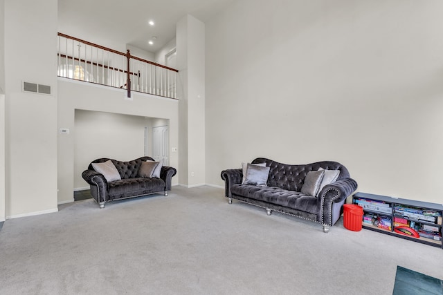 20261 Ramblewood Dr, Macomb, MI 48044 - carpeted living room with a towering ceiling, baseboards, and recessed lighting