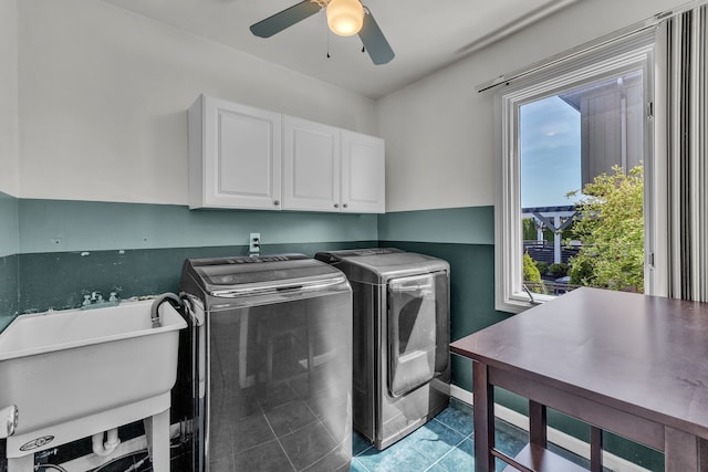 20261 Ramblewood Dr, Macomb, MI 48044 - clothes washing area with cabinet space, washer and dryer, healthy amount of natural light, and ceiling fan