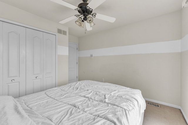 20261 Ramblewood Dr, Macomb, MI 48044 - bedroom with light carpet, a closet, baseboards, and a ceiling fan
