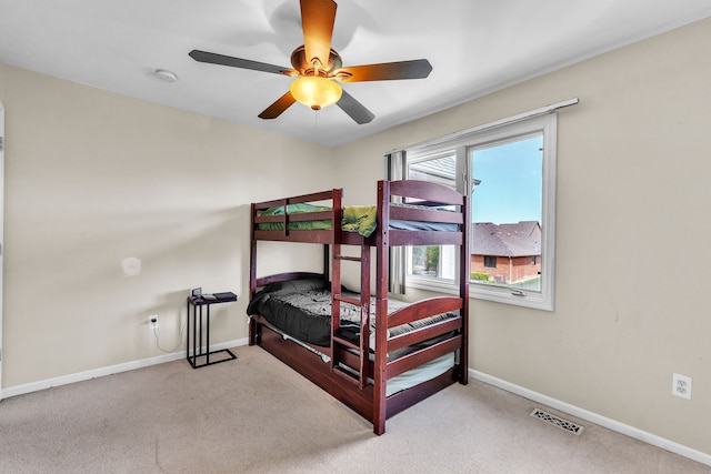 20261 Ramblewood Dr, Macomb, MI 48044 - bedroom with carpet floors, baseboards, and a ceiling fan