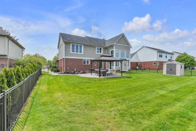 20261 Ramblewood Dr, Macomb, MI 48044 - back of property featuring a gazebo, a patio, a storage shed, brick siding, and an outdoor structure