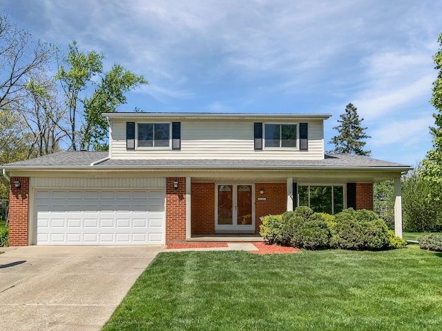 2749 English Dr, Troy, MI 48085 - traditional home featuring brick siding, concrete driveway, and a front yard