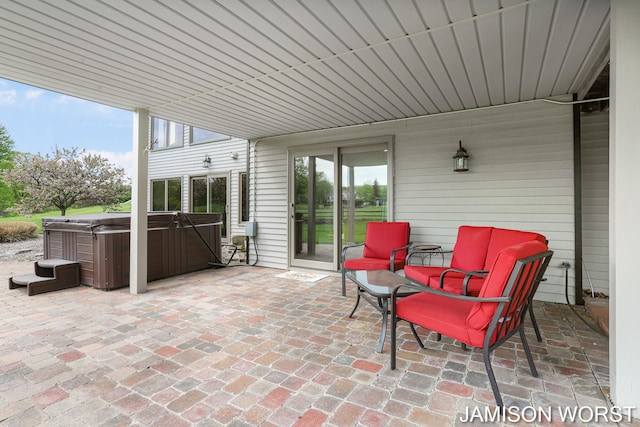 view of patio with a hot tub