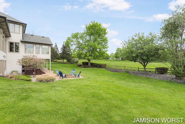 view of yard with a patio and a fire pit