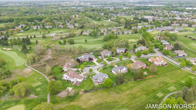 aerial view of property's location with nearby suburban area and a golf club