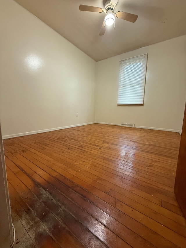 206 Frazier St, River Rouge, MI 48218 - empty room featuring wood-type flooring, a ceiling fan, and baseboards