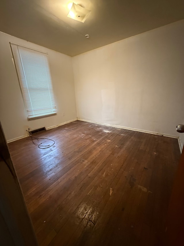 206 Frazier St, River Rouge, MI 48218 - spare room with dark wood finished floors and baseboards