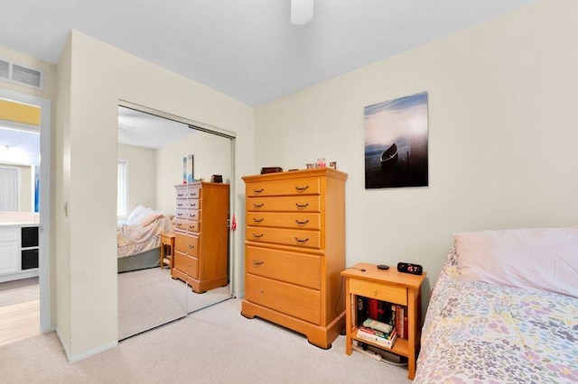 24459 Surfside Rd, Novi, MI 48374 - bedroom featuring carpet flooring, a closet, and ceiling fan