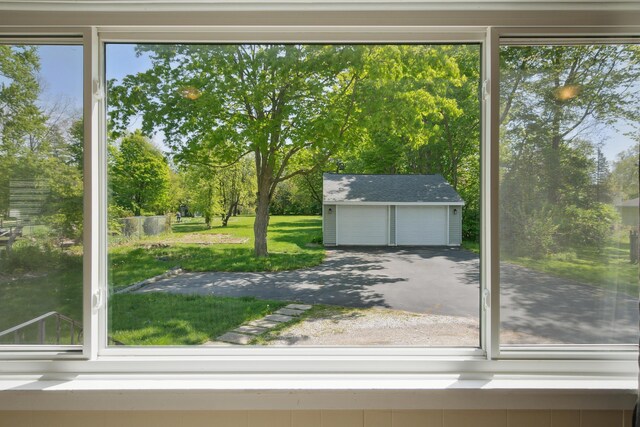 entryway with view of wooded area