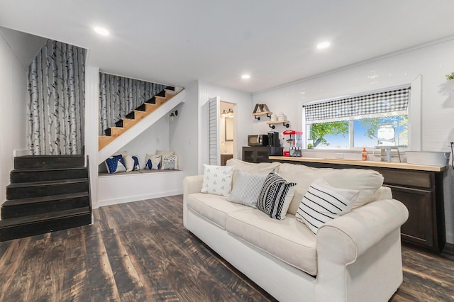 living room with wood finished floors, stairway, and recessed lighting