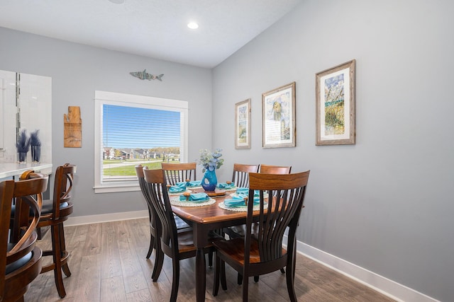 3080 Silver Fir Ct, Holland, MI 49424 - dining space featuring baseboards, wood finished floors, and recessed lighting