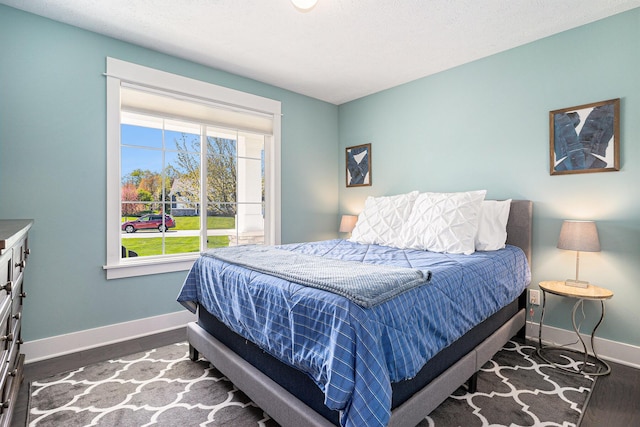 3080 Silver Fir Ct, Holland, MI 49424 - bedroom featuring baseboards and wood finished floors