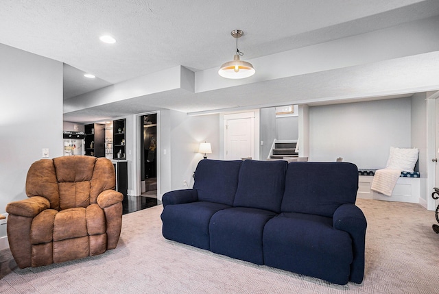 3080 Silver Fir Ct, Holland, MI 49424 - living area with stairway, recessed lighting, carpet floors, baseboards, and a textured ceiling