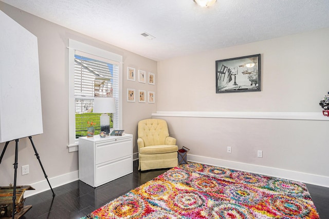 3080 Silver Fir Ct, Holland, MI 49424 - sitting room with baseboards, dark wood finished floors, and a textured ceiling