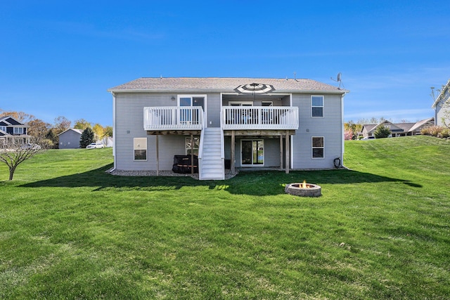 3080 Silver Fir Ct, Holland, MI 49424 - rear view of property with an outdoor fire pit, a deck, and a yard