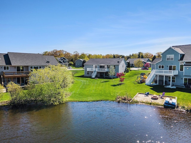 3080 Silver Fir Ct, Holland, MI 49424 - water view featuring stairs, a fire pit, and nearby suburban area