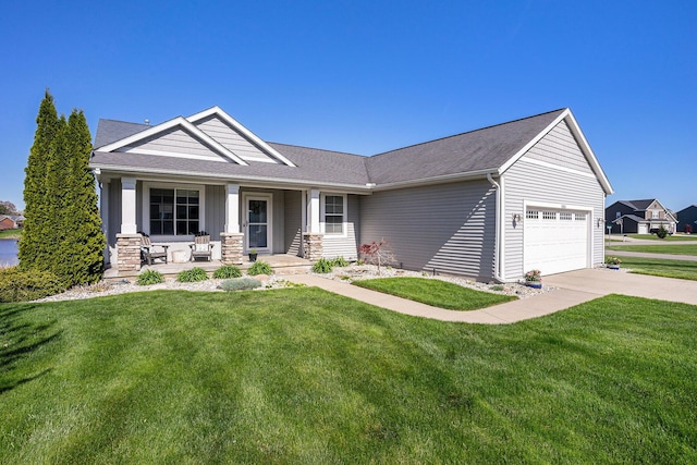 3080 Silver Fir Ct, Holland, MI 49424 - view of front of home with a porch, a garage, concrete driveway, and a front yard