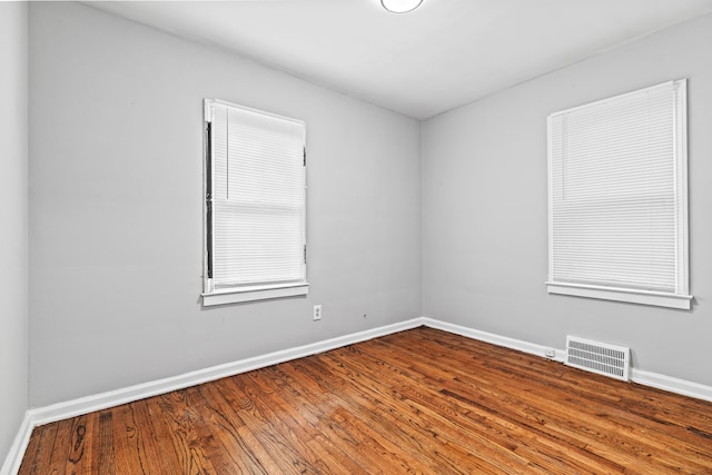 9327 Prest St, Detroit, MI 48228 - empty room with baseboards and wood finished floors