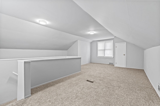 9327 Prest St, Detroit, MI 48228 - additional living space featuring lofted ceiling, carpet flooring, and baseboards