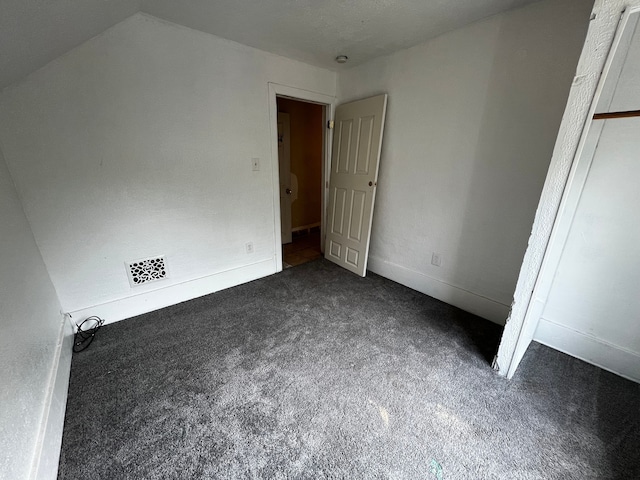 63 Hamilton St, Pontiac, MI 48342 - unfurnished bedroom featuring dark carpet