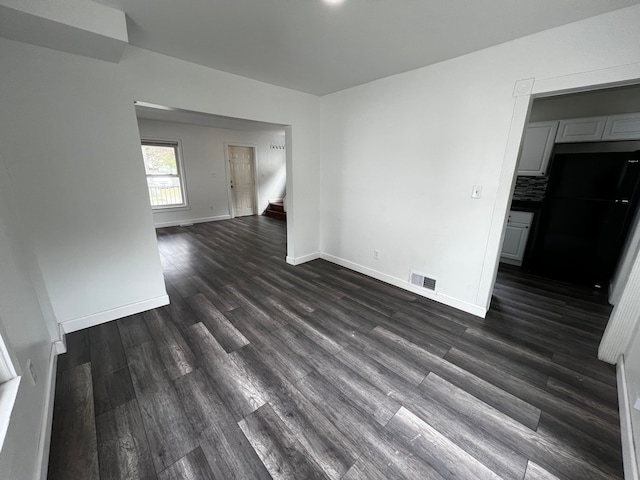 63 Hamilton St, Pontiac, MI 48342 - spare room with baseboards and dark wood-style floors