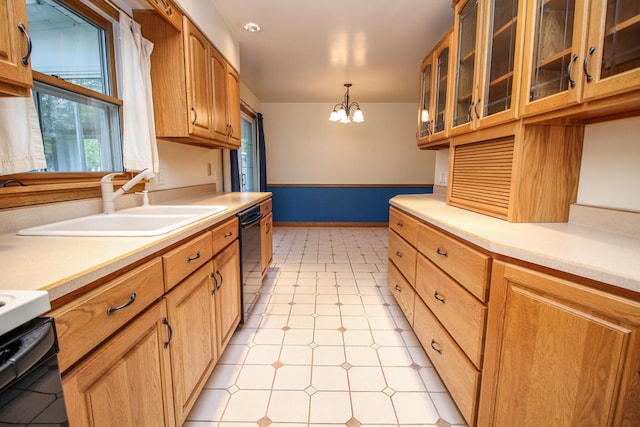 6339 Westchester St, Portage, MI 49024 - kitchen featuring a sink, light flooring, light countertops, and range