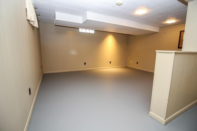 6339 Westchester St, Portage, MI 49024 - basement with baseboards and wood walls