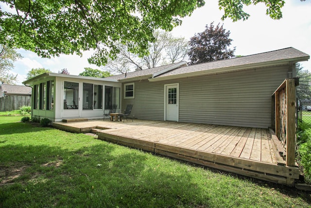 6339 Westchester St, Portage, MI 49024 - back of property featuring a sunroom and a wooden deck