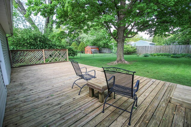 6339 Westchester St, Portage, MI 49024 - deck featuring a storage shed and an outdoor structure