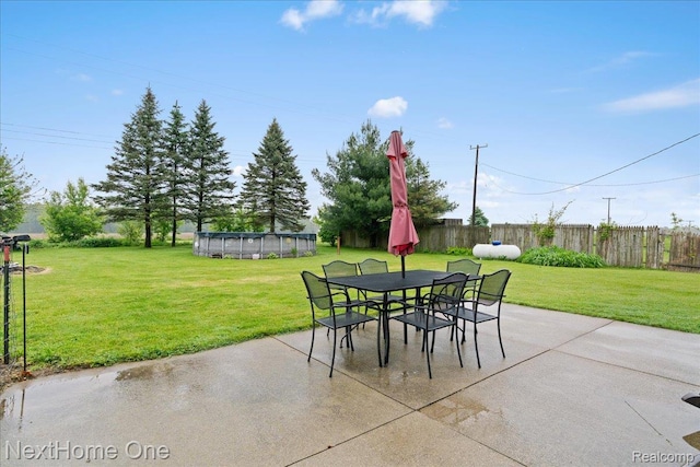 9220 Crofoot Rd, Fowlerville, MI 48836 - view of patio / terrace with a covered pool and outdoor dining area