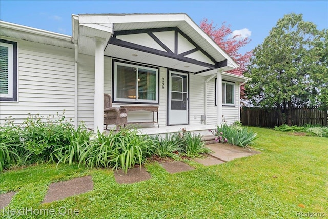9220 Crofoot Rd, Fowlerville, MI 48836 - view of front of house featuring covered porch