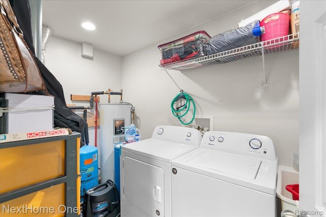 9220 Crofoot Rd, Fowlerville, MI 48836 - laundry room featuring washer and clothes dryer, water heater, and recessed lighting