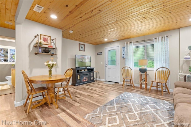 9220 Crofoot Rd, Fowlerville, MI 48836 - dining space with wood ceiling, recessed lighting, wood finished floors, and baseboards