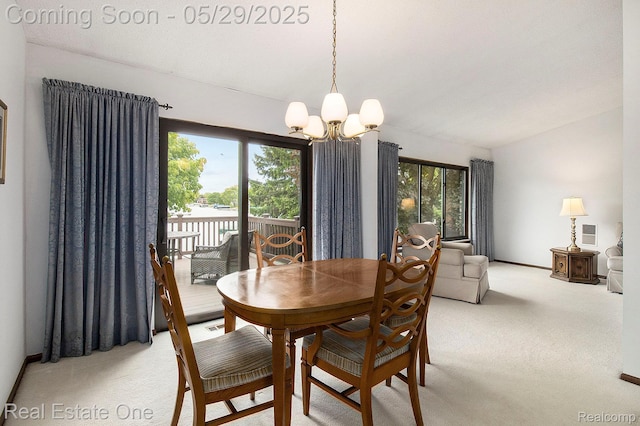 4976 Ledgewood Dr, Commerce Twp, MI 48382 - dining area featuring a chandelier and light carpet