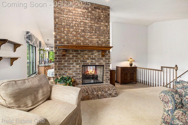 4976 Ledgewood Dr, Commerce Twp, MI 48382 - carpeted living area with a fireplace