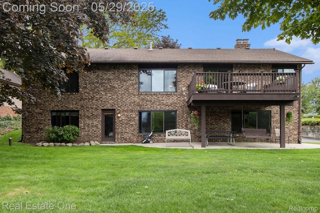 4976 Ledgewood Dr, Commerce Twp, MI 48382 - rear view of property with a patio area, a lawn, brick siding, and a chimney