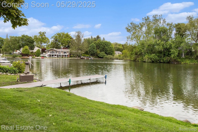 4976 Ledgewood Dr, Commerce Twp, MI 48382 - dock featuring a water view and a lawn