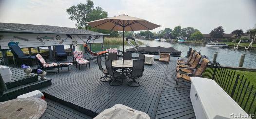 8889 Anchor Bay Dr, Clay, MI 48001 - deck featuring a water view