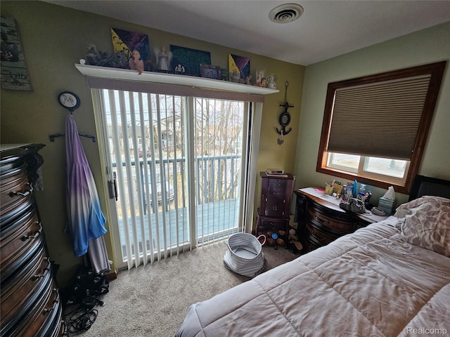 8889 Anchor Bay Dr, Clay, MI 48001 - bedroom with carpet and access to exterior