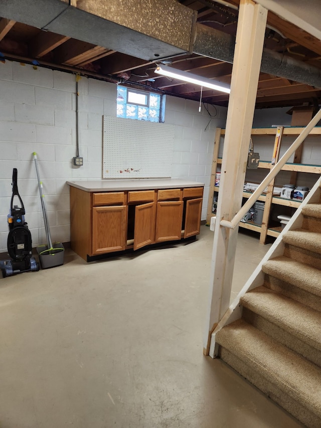 501 Virginia Ave, East Lansing, MI 48823 - basement with stairs and concrete block wall